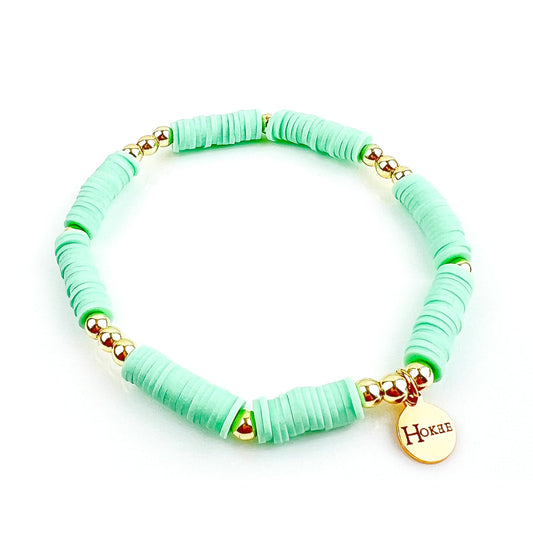 Bracelet AURA Menthe en perles heishi avec détails dorés