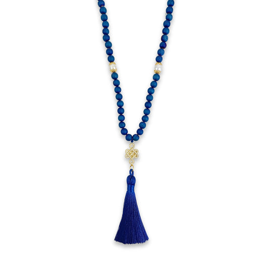 Mala ANAÏS en agate bleue avec pompon bleu marine