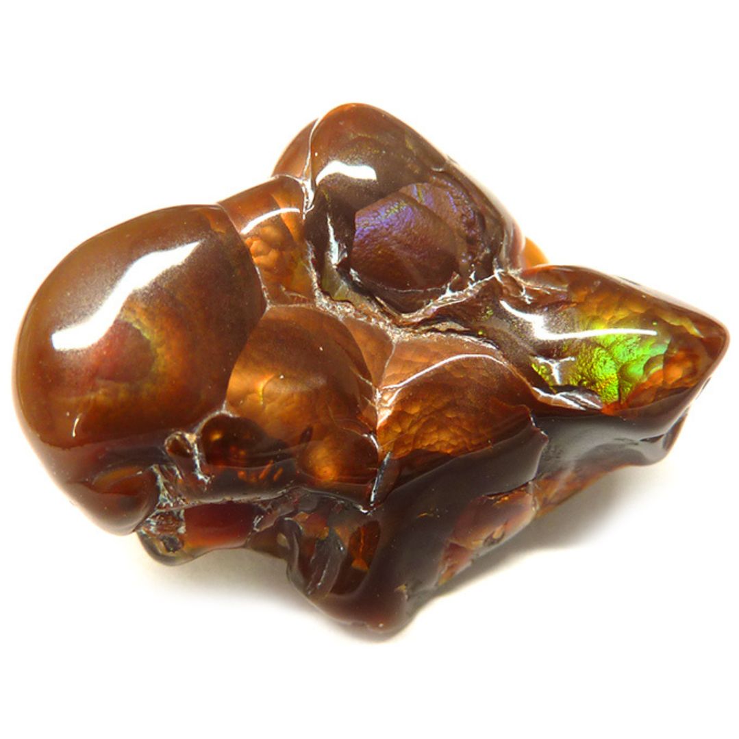 Agate feu naturelle aux reflets flamboyants, pierre de vitalité et d’ancrage utilisée en lithothérapie pour renforcer l’énergie et la force intérieure.