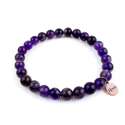 Bracelet en améthyste naturelle 8 mm avec finition rose gold – Hokee Minéraux